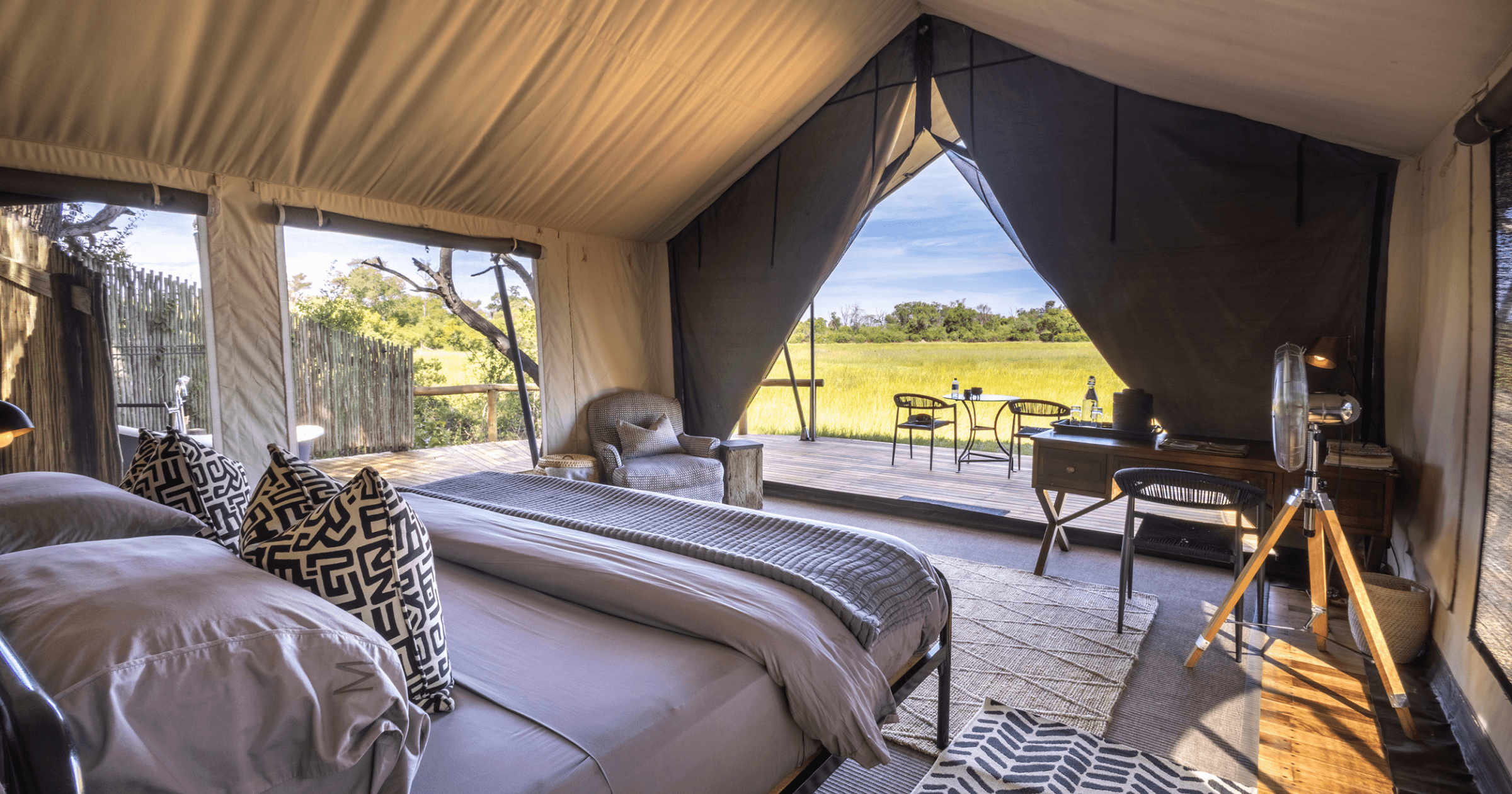 Fotografia di safari in Botswana con atmosfera elegante e luce calda.